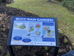 The Rain Garden Sign is installed.